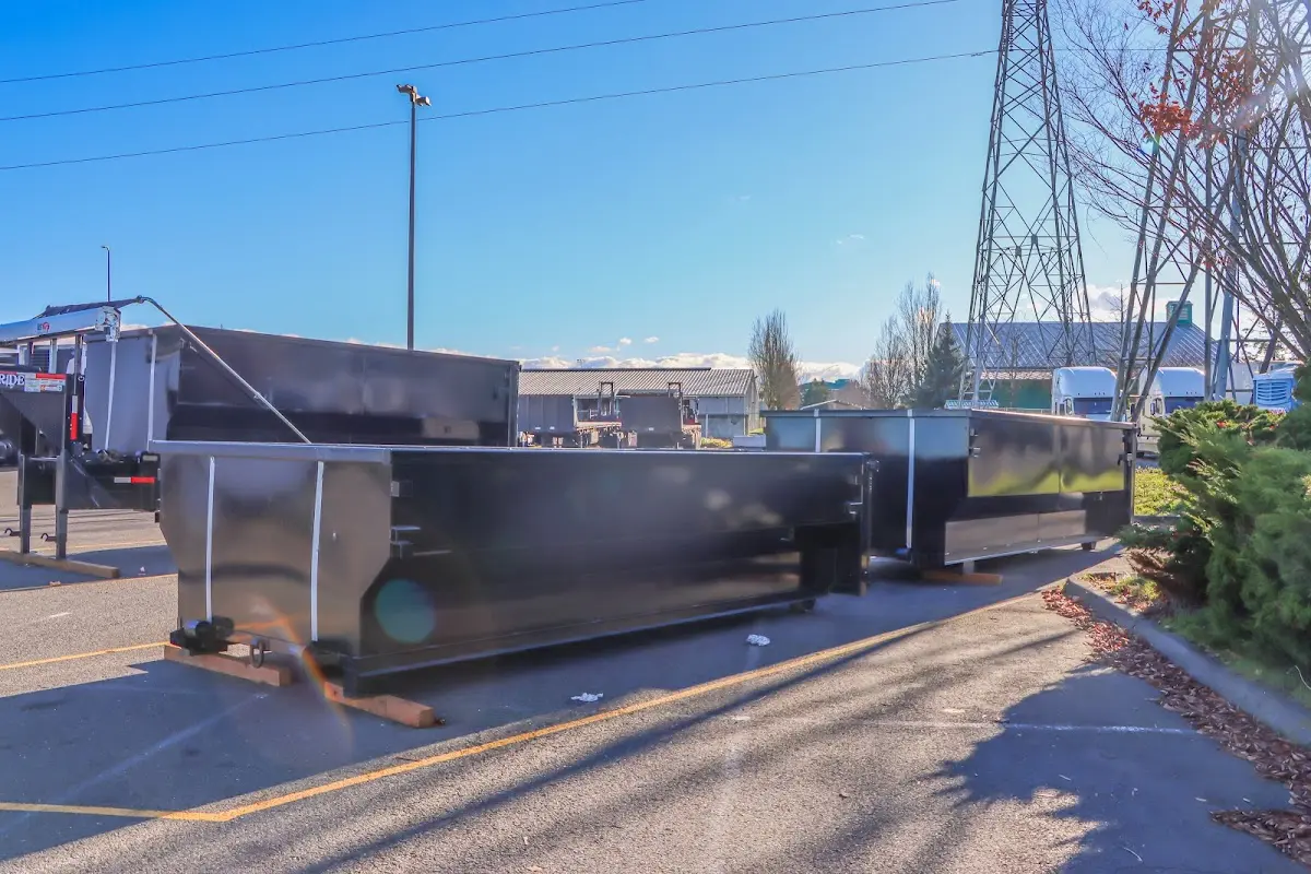 Roll-off dumpster ready for waste disposal at job site for Roofing Dumpster Rental in Atlas
